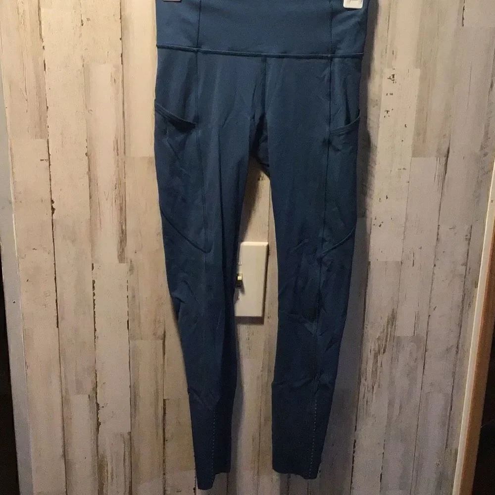 Lululemon spandex pants, blue and color. No size tag waist measures 11 3/4